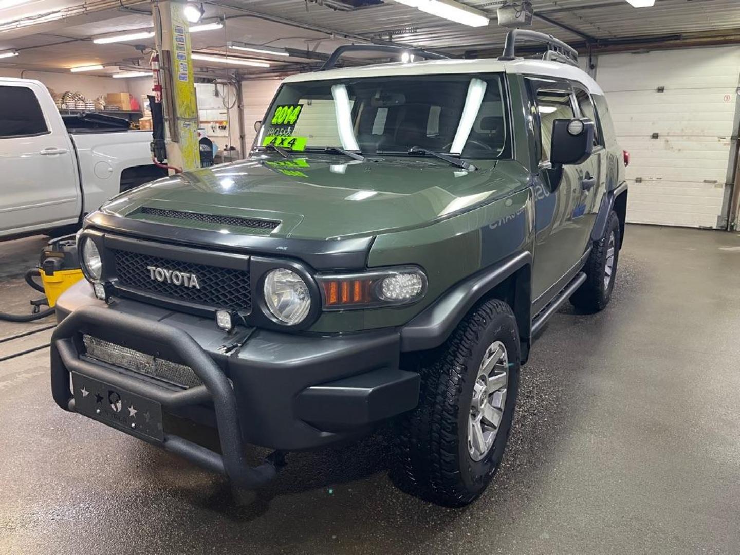2014 GREEN TOYOTA FJ CRUISER (JTEBU4BF2EK) with an 4.0L engine, Automatic transmission, located at 2525 S. Cushman, Fairbanks, AK, 99701, (907) 452-5707, 64.824036, -147.712311 - Photo#1