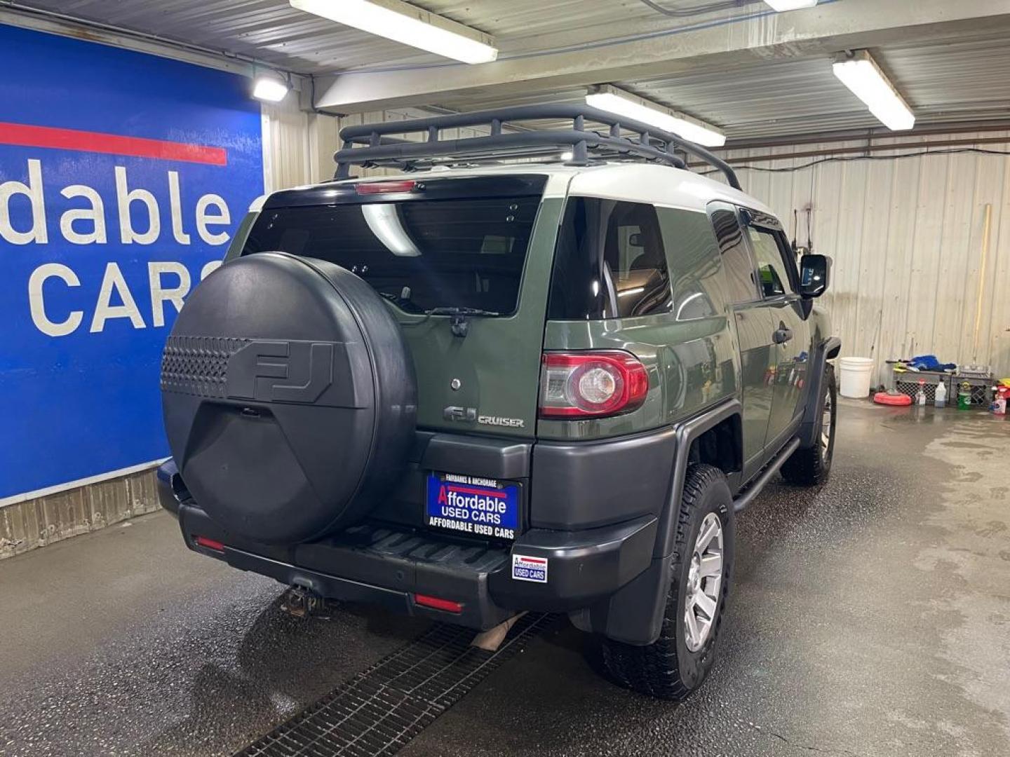 2014 GREEN TOYOTA FJ CRUISER (JTEBU4BF2EK) with an 4.0L engine, Automatic transmission, located at 2525 S. Cushman, Fairbanks, AK, 99701, (907) 452-5707, 64.824036, -147.712311 - Photo#2