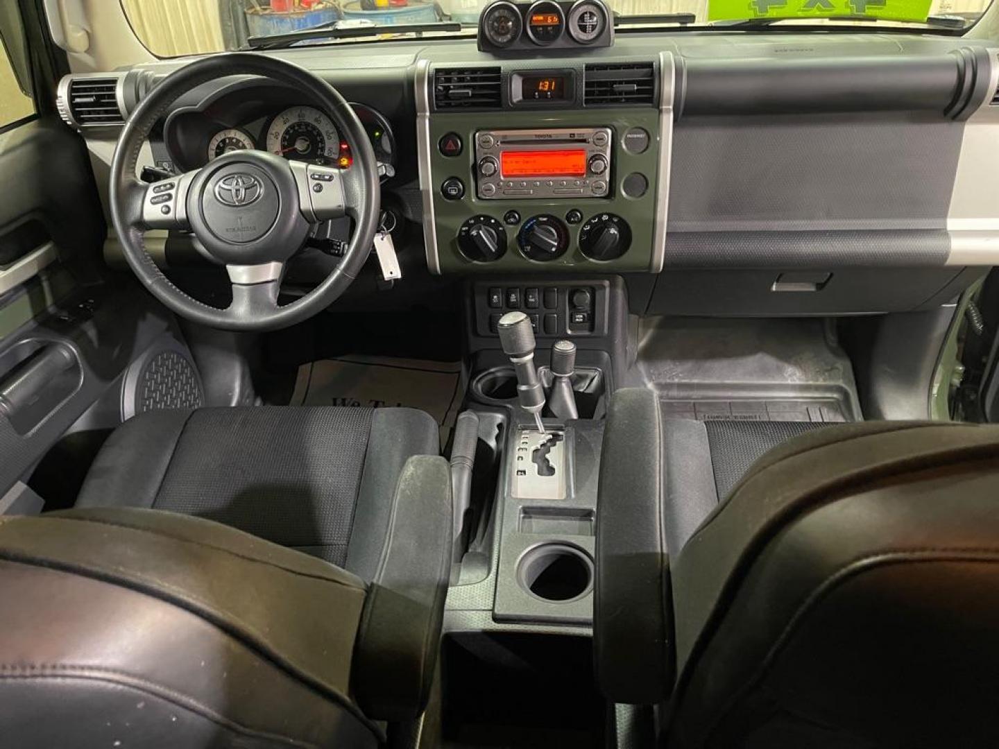 2014 GREEN TOYOTA FJ CRUISER (JTEBU4BF2EK) with an 4.0L engine, Automatic transmission, located at 2525 S. Cushman, Fairbanks, AK, 99701, (907) 452-5707, 64.824036, -147.712311 - Photo#5