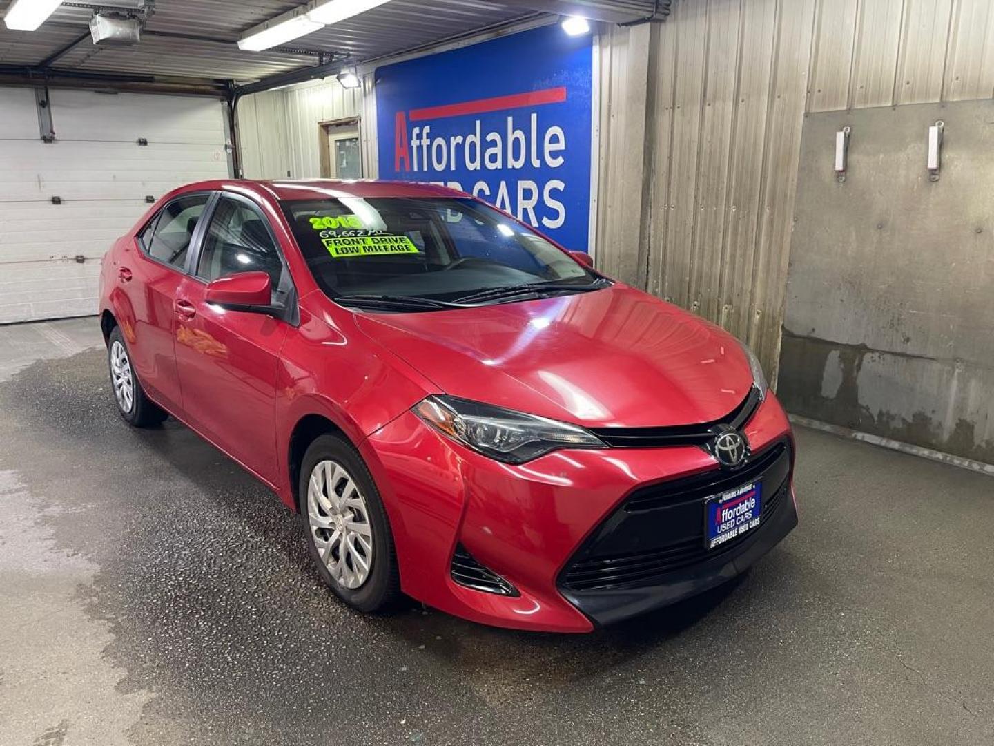 2018 RED TOYOTA COROLLA L (5YFBURHE9JP) with an 1.8L engine, Continuously Variable transmission, located at 2525 S. Cushman, Fairbanks, AK, 99701, (907) 452-5707, 64.824036, -147.712311 - Photo#0