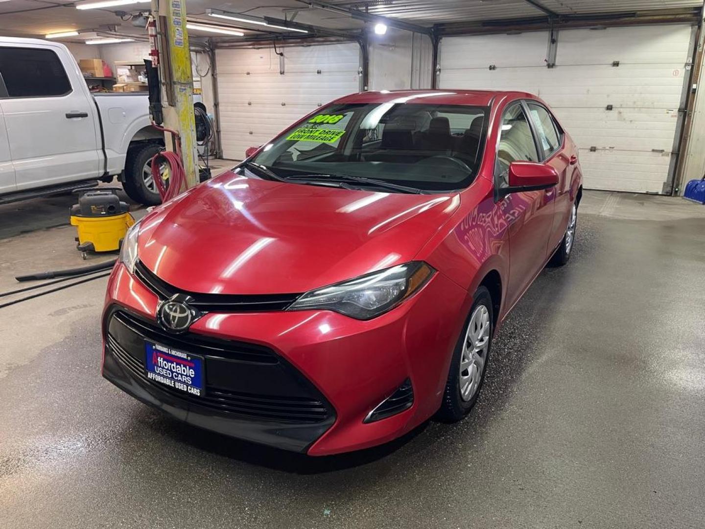 2018 RED TOYOTA COROLLA L (5YFBURHE9JP) with an 1.8L engine, Continuously Variable transmission, located at 2525 S. Cushman, Fairbanks, AK, 99701, (907) 452-5707, 64.824036, -147.712311 - Photo#1