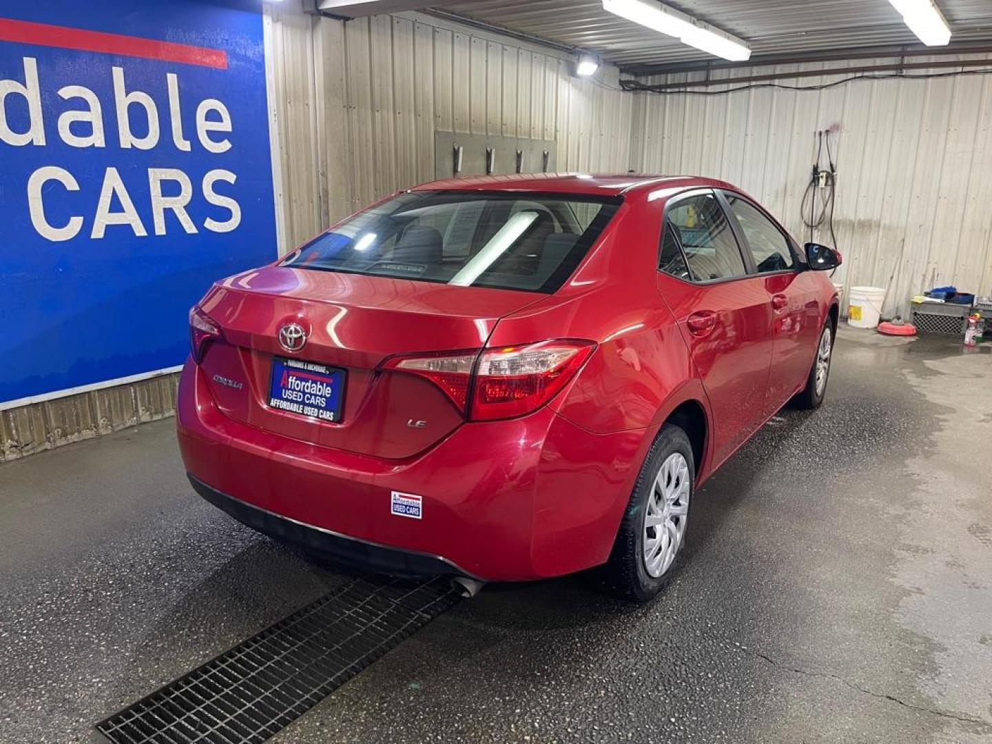 2018 RED TOYOTA COROLLA L (5YFBURHE9JP) with an 1.8L engine, Continuously Variable transmission, located at 2525 S. Cushman, Fairbanks, AK, 99701, (907) 452-5707, 64.824036, -147.712311 - Photo#2