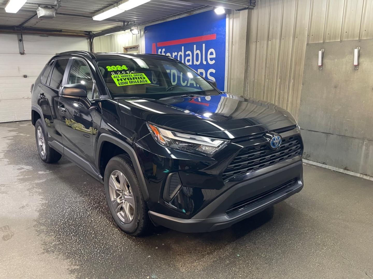 2024 BLACK TOYOTA RAV4 LE HYBRID LE (2T3LWRFV0RW) with an 2.5L engine, Continuously Variable transmission, located at 2525 S. Cushman, Fairbanks, AK, 99701, (907) 452-5707, 64.824036, -147.712311- Photo#0