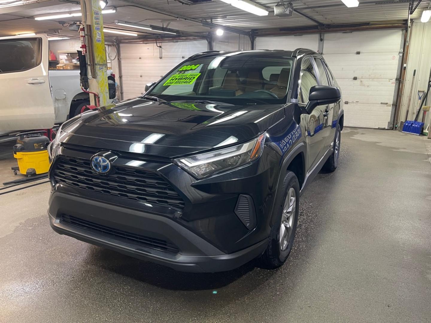 2024 BLACK TOYOTA RAV4 LE HYBRID LE (2T3LWRFV0RW) with an 2.5L engine, Continuously Variable transmission, located at 2525 S. Cushman, Fairbanks, AK, 99701, (907) 452-5707, 64.824036, -147.712311- Photo#1