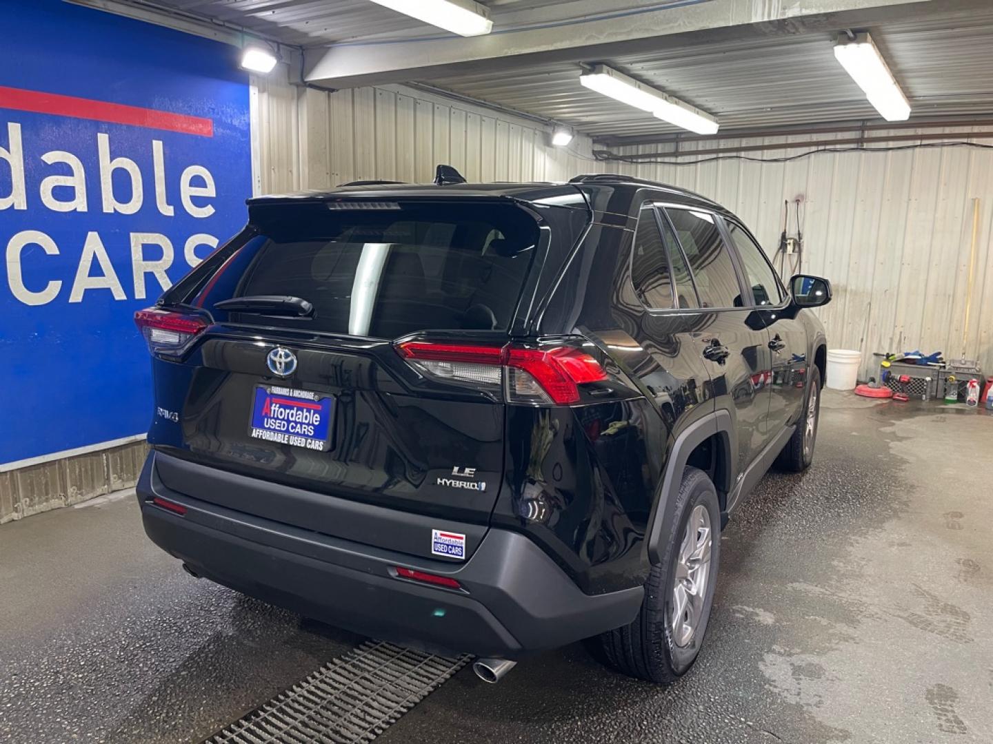 2024 BLACK TOYOTA RAV4 LE HYBRID LE (2T3LWRFV0RW) with an 2.5L engine, Continuously Variable transmission, located at 2525 S. Cushman, Fairbanks, AK, 99701, (907) 452-5707, 64.824036, -147.712311- Photo#2