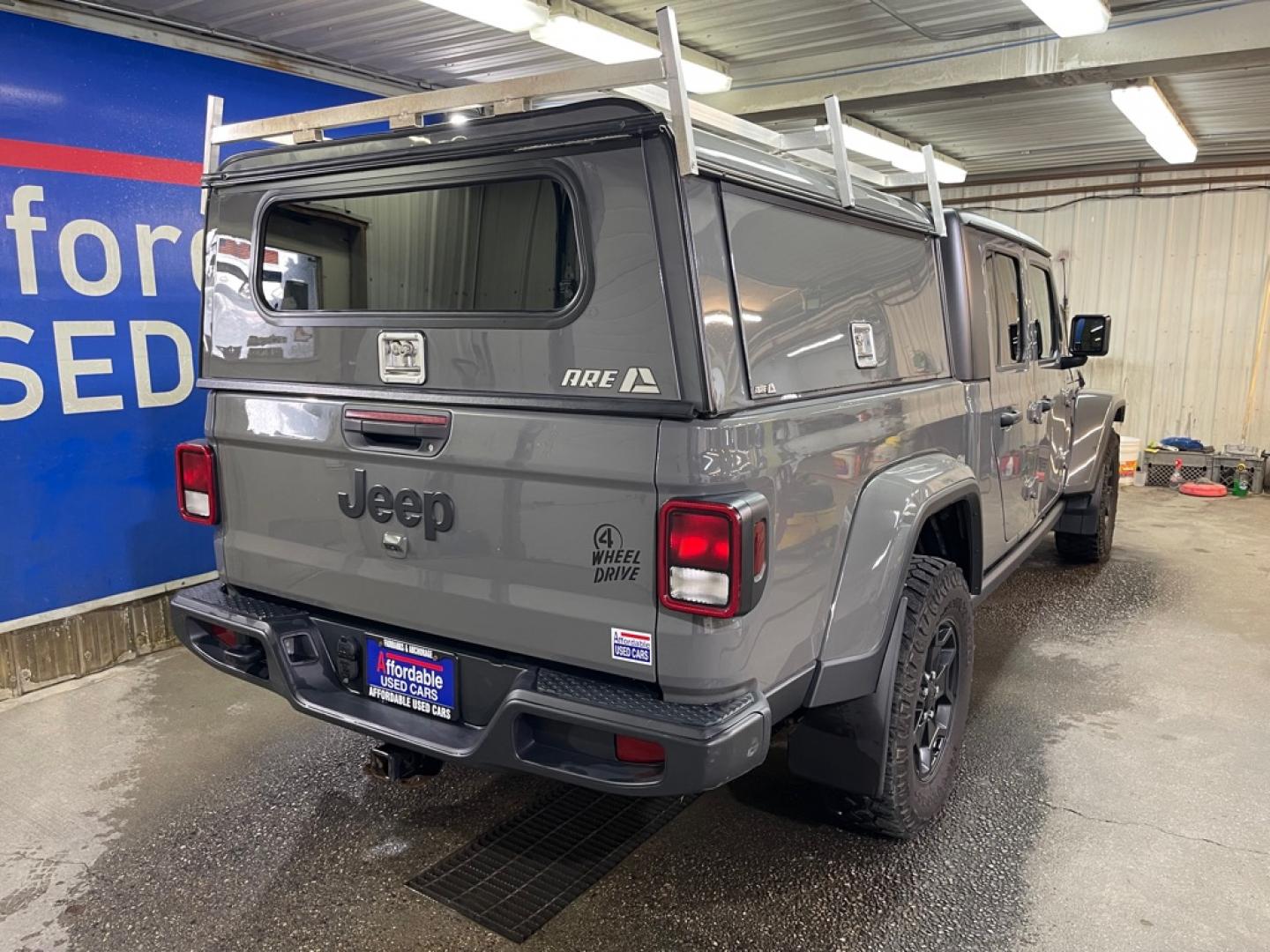 2021 GREEN JEEP GLADIATOR SPORT (1C6HJTAG9ML) with an 3.6L engine, Automatic transmission, located at 2525 S. Cushman, Fairbanks, AK, 99701, (907) 452-5707, 64.824036, -147.712311- Photo#2