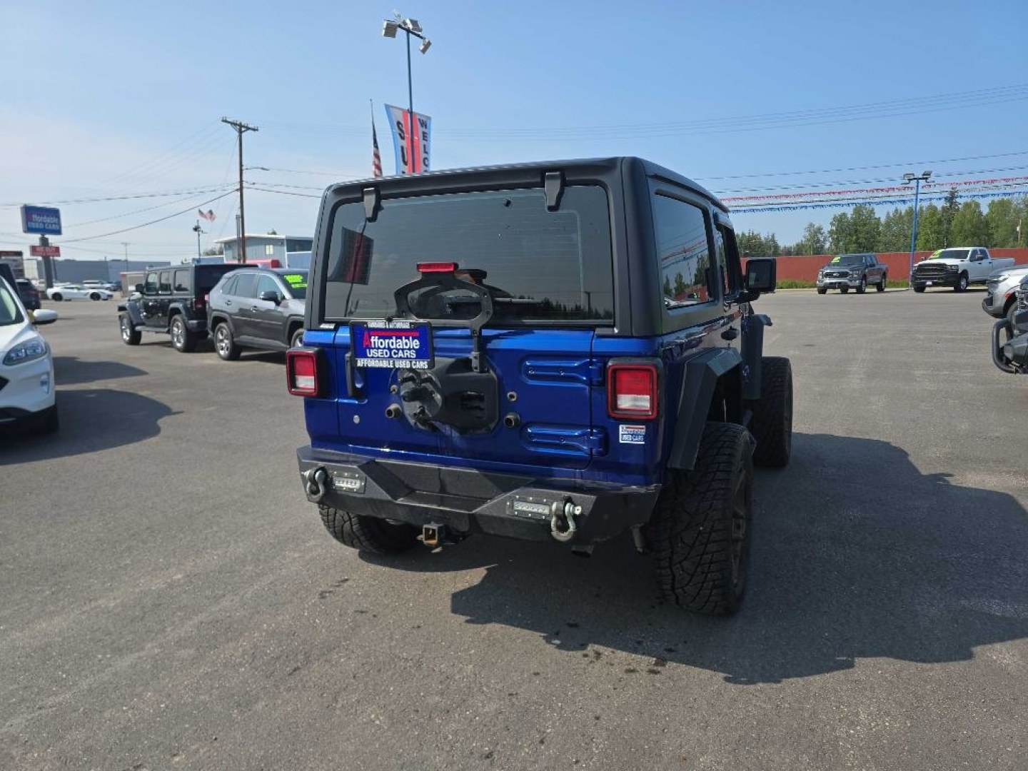 2019 BLUE JEEP WRANGLER SPORT (1C4GJXAG1KW) with an 3.6L engine, Automatic transmission, located at 2525 S. Cushman, Fairbanks, AK, 99701, (907) 452-5707, 64.824036, -147.712311- Photo#2