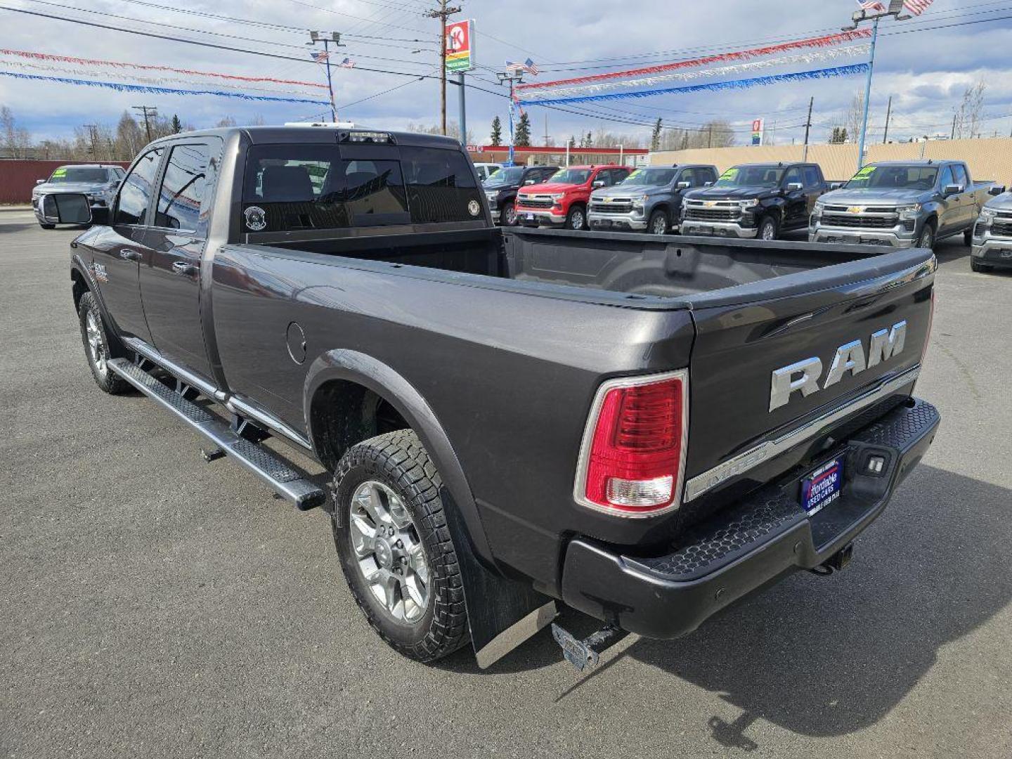 2017 BLACK RAM 3500 Limited (3C63R3KL4HG) with an 6.7L engine, Automatic transmission, located at 2525 S. Cushman, Fairbanks, AK, 99701, (907) 452-5707, 64.824036, -147.712311 - Photo#3