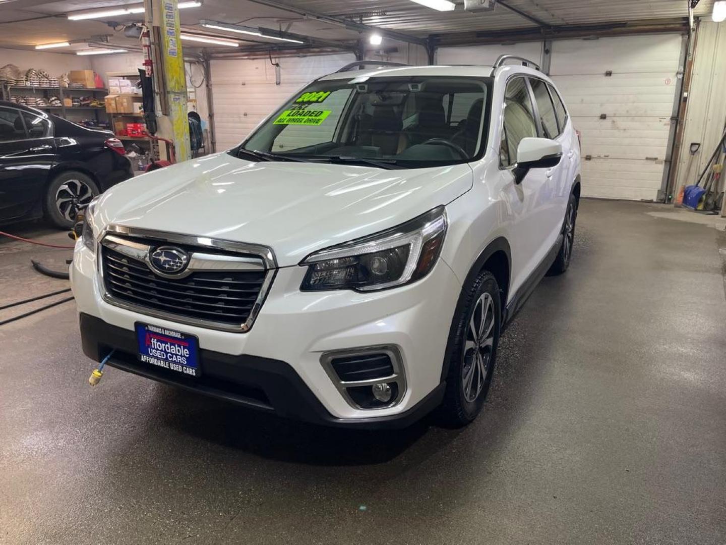 2021 WHITE SUBARU FORESTER LIMITED (JF2SKAUC8MH) with an 2.5L engine, Automatic transmission, located at 2525 S. Cushman, Fairbanks, AK, 99701, (907) 452-5707, 64.824036, -147.712311 - Photo#1
