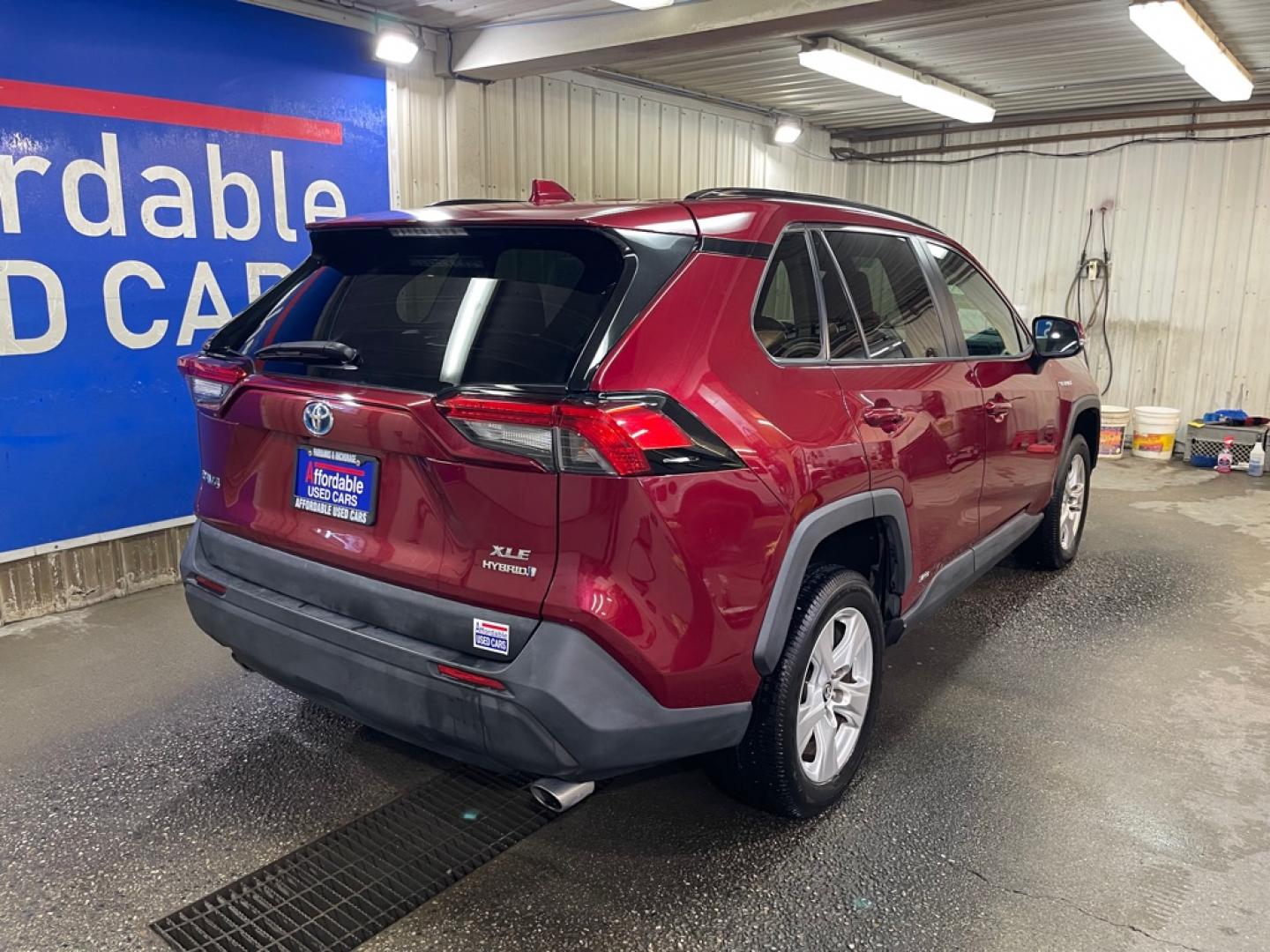 2021 RED TOYOTA RAV4 XLE XLE (4T3RWRFV7MU) with an 2.5L engine, Continuously Variable transmission, located at 2525 S. Cushman, Fairbanks, AK, 99701, (907) 452-5707, 64.824036, -147.712311- Photo#2