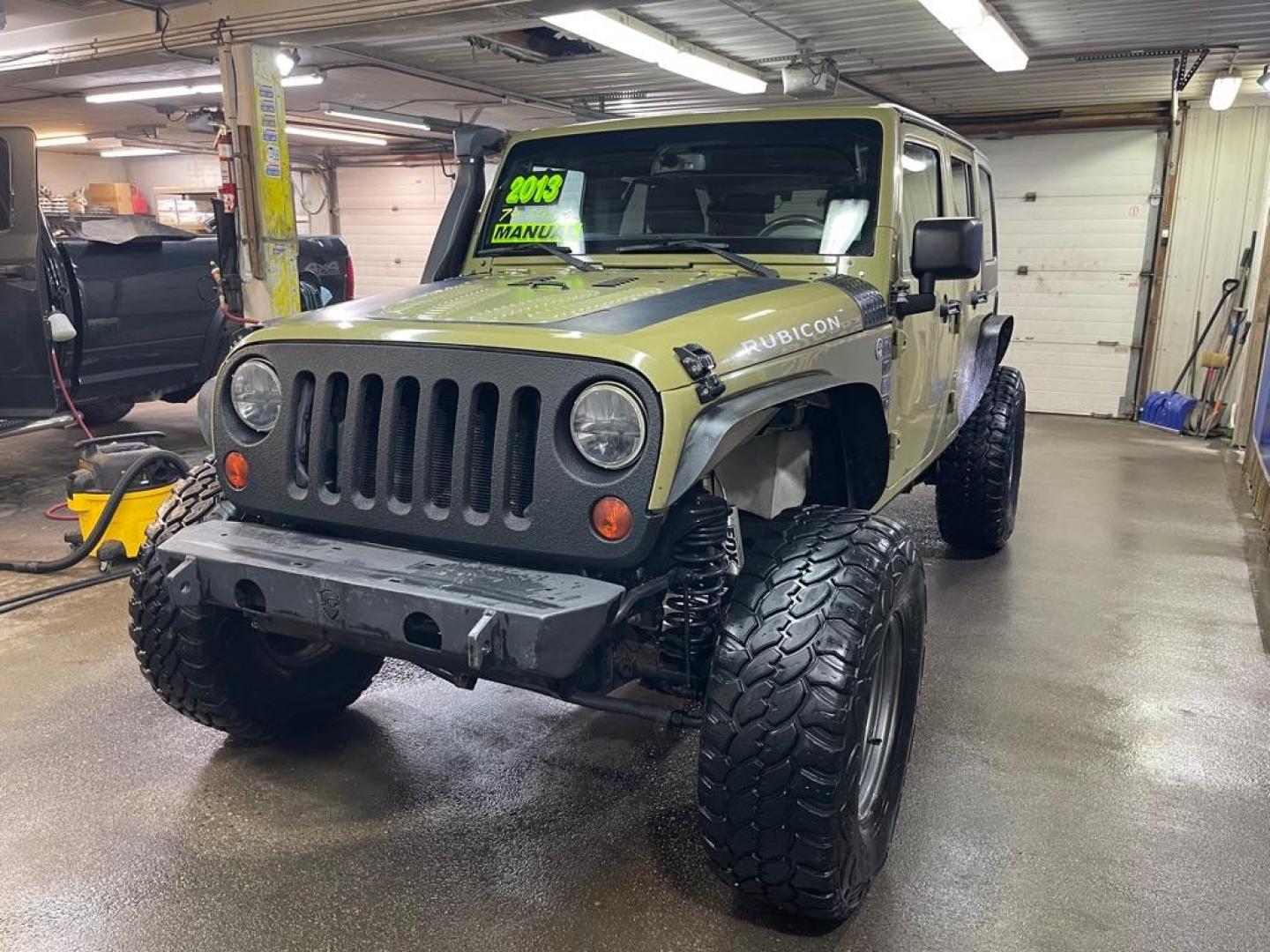2013 GREEN JEEP WRANGLER UNLIMI RUBICON (1C4BJWFG3DL) with an 3.6L engine, Automatic transmission, located at 2525 S. Cushman, Fairbanks, AK, 99701, (907) 452-5707, 64.824036, -147.712311 - Photo#1