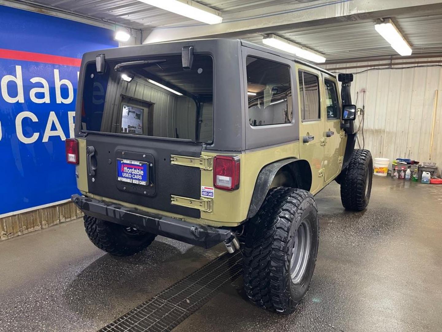 2013 GREEN JEEP WRANGLER UNLIMI RUBICON (1C4BJWFG3DL) with an 3.6L engine, Automatic transmission, located at 2525 S. Cushman, Fairbanks, AK, 99701, (907) 452-5707, 64.824036, -147.712311 - Photo#2
