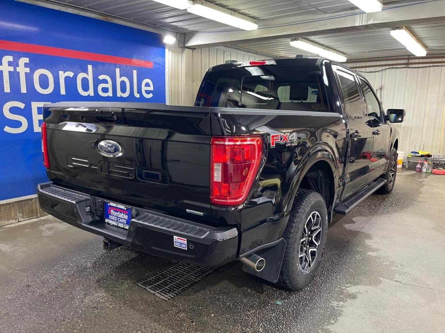 2023 BLACK FORD F150 XLT FX4 SUPERCREW (1FTFW1E84PF) with an 3.5L engine, Automatic transmission, located at 2525 S. Cushman, Fairbanks, AK, 99701, (907) 452-5707, 64.824036, -147.712311 - Photo#2