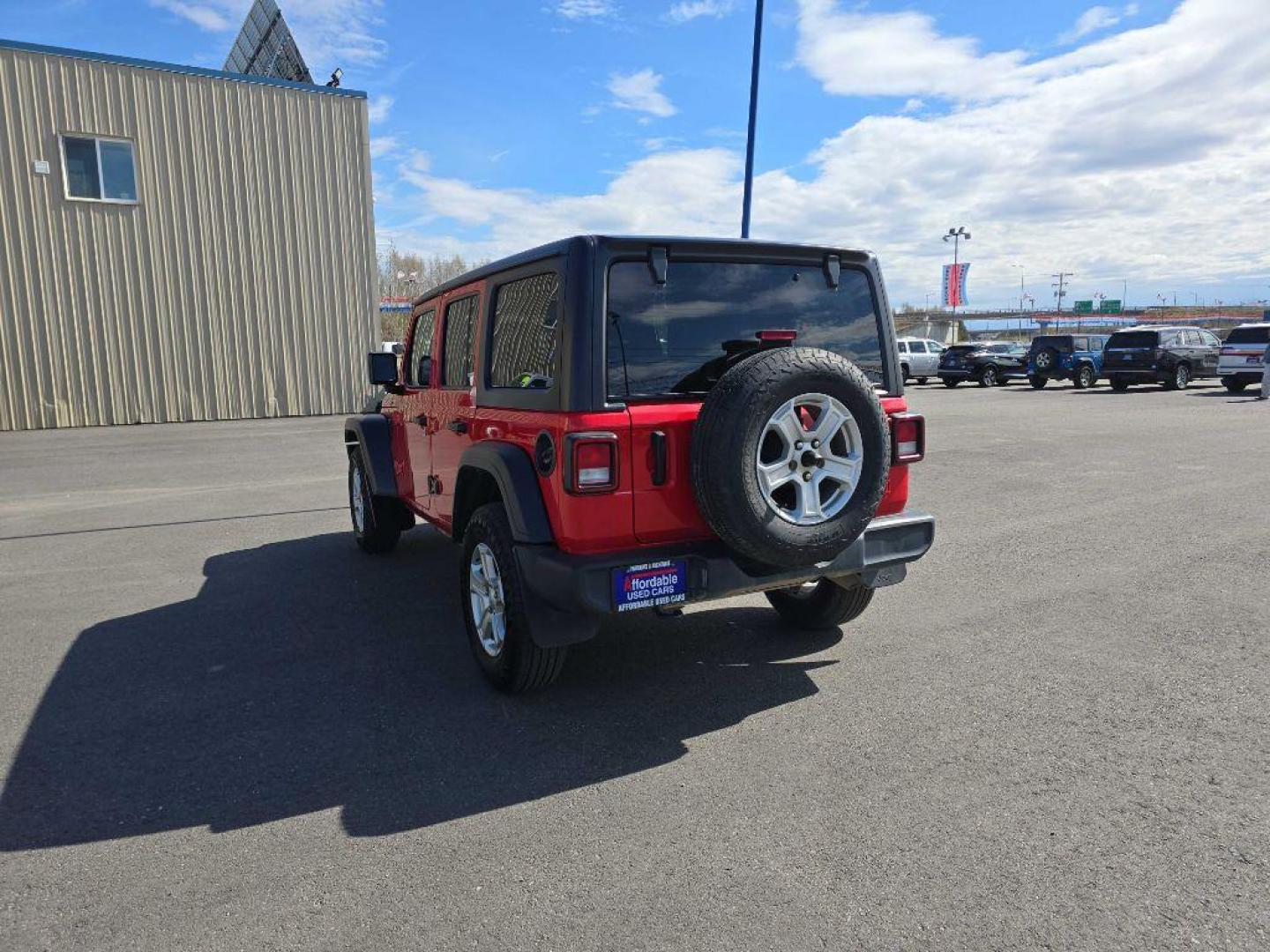 2022 RED JEEP WRANGLER UNLIMI SPORT (1C4HJXDG0NW) with an 3.6L engine, Automatic transmission, located at 2525 S. Cushman, Fairbanks, AK, 99701, (907) 452-5707, 64.824036, -147.712311 - Photo#3