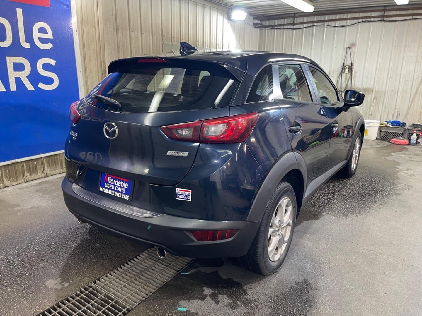 2016 BLUE MAZDA CX-3 TOURING (JM1DKBC77G0) with an 2.0L engine, Automatic transmission, located at 2525 S. Cushman, Fairbanks, AK, 99701, (907) 452-5707, 64.824036, -147.712311- Photo#2