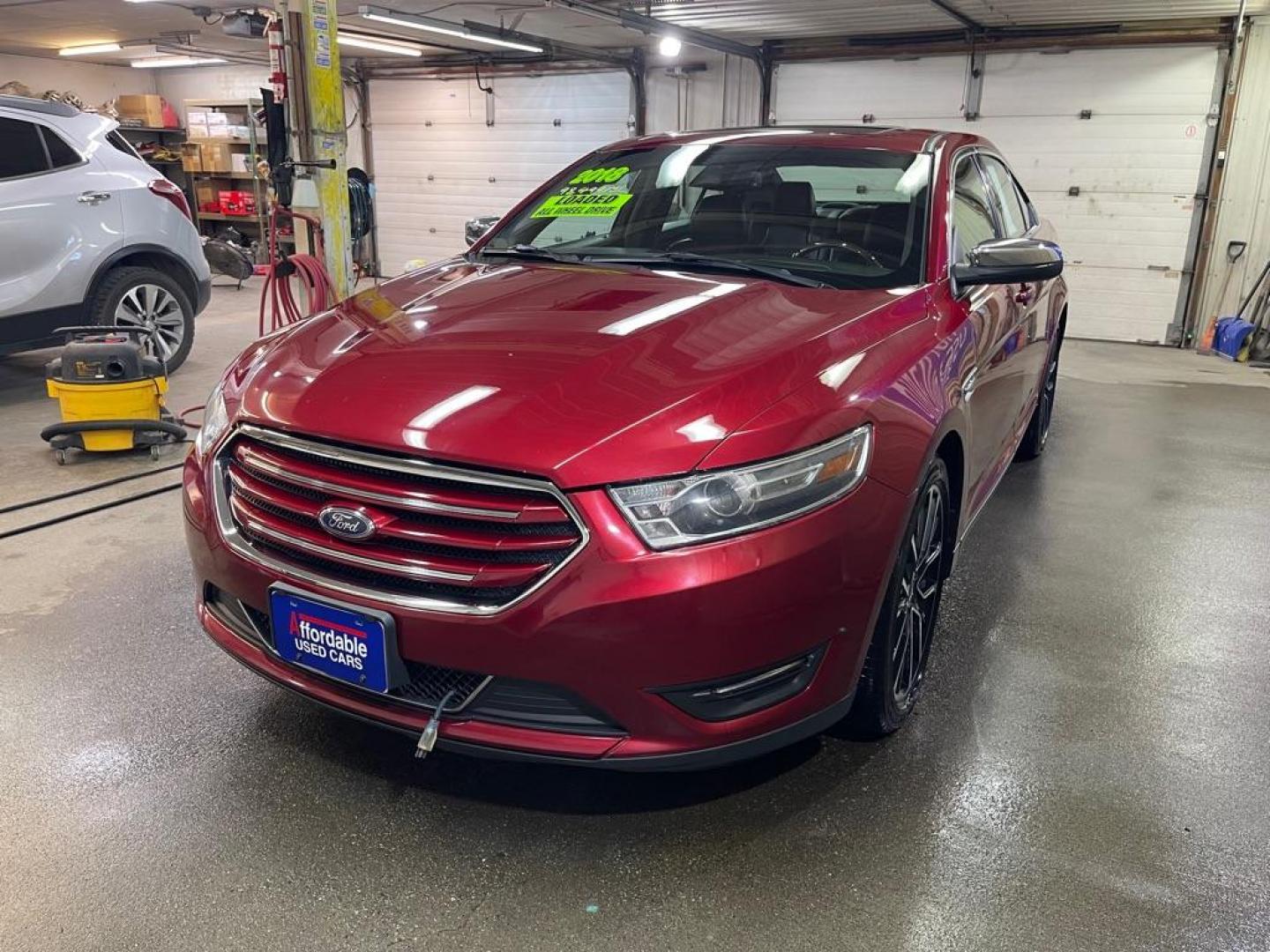 2018 MAROON FORD TAURUS LIMITED (1FAHP2J81JG) with an 3.5L engine, Automatic transmission, located at 2525 S. Cushman, Fairbanks, AK, 99701, (907) 452-5707, 64.824036, -147.712311 - Photo#1