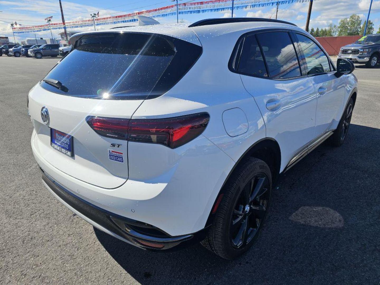 2023 WHITE BUICK ENVISION ESSENCE (LRBFZPR45PD) with an 2.0L engine, Automatic transmission, located at 2525 S. Cushman, Fairbanks, AK, 99701, (907) 452-5707, 64.824036, -147.712311 - Photo#4