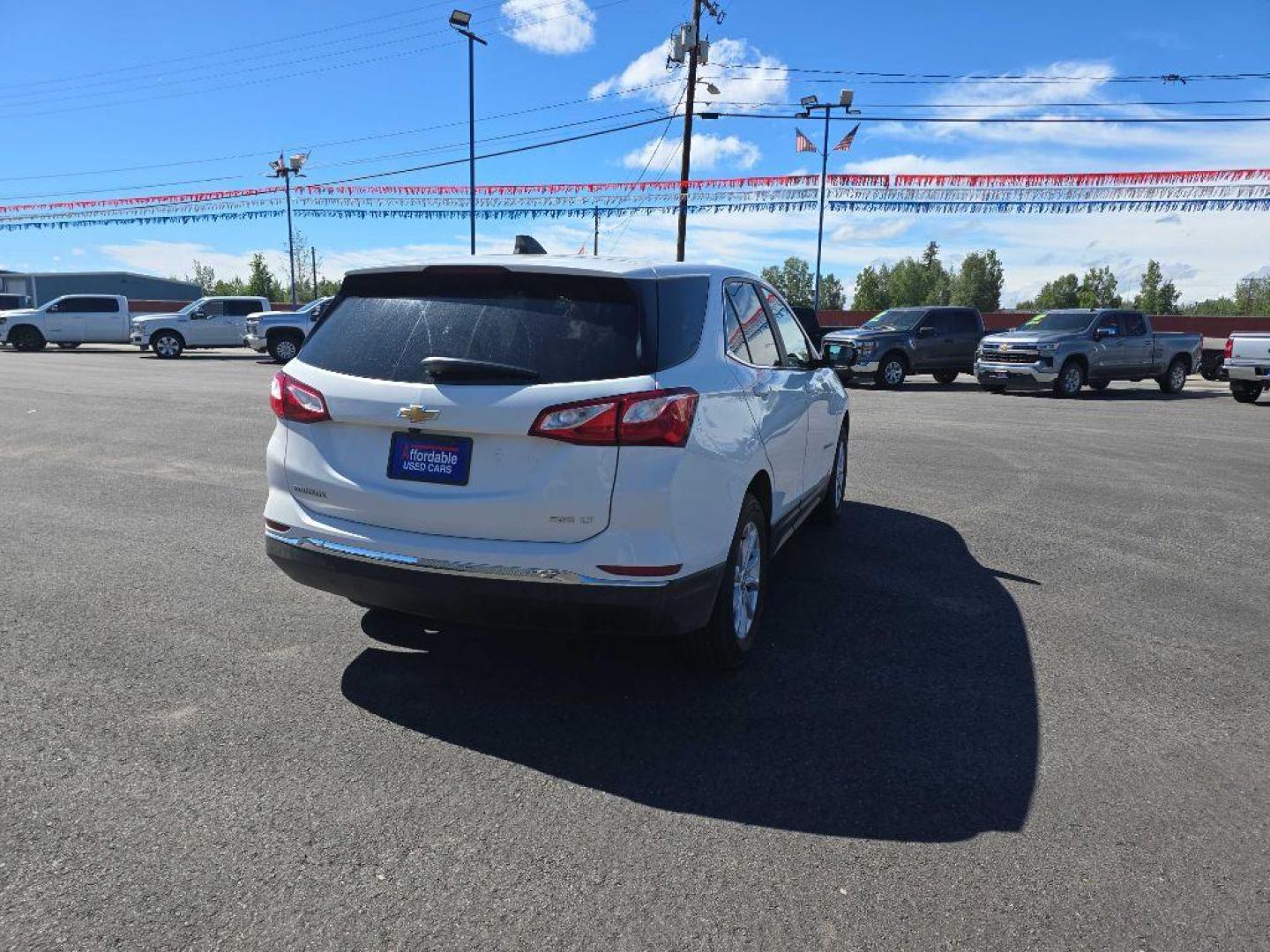 2021 WHITE CHEVROLET EQUINOX LT (3GNAXUEV6MS) with an 1.5L engine, Automatic transmission, located at 2525 S. Cushman, Fairbanks, AK, 99701, (907) 452-5707, 64.824036, -147.712311- Photo#2