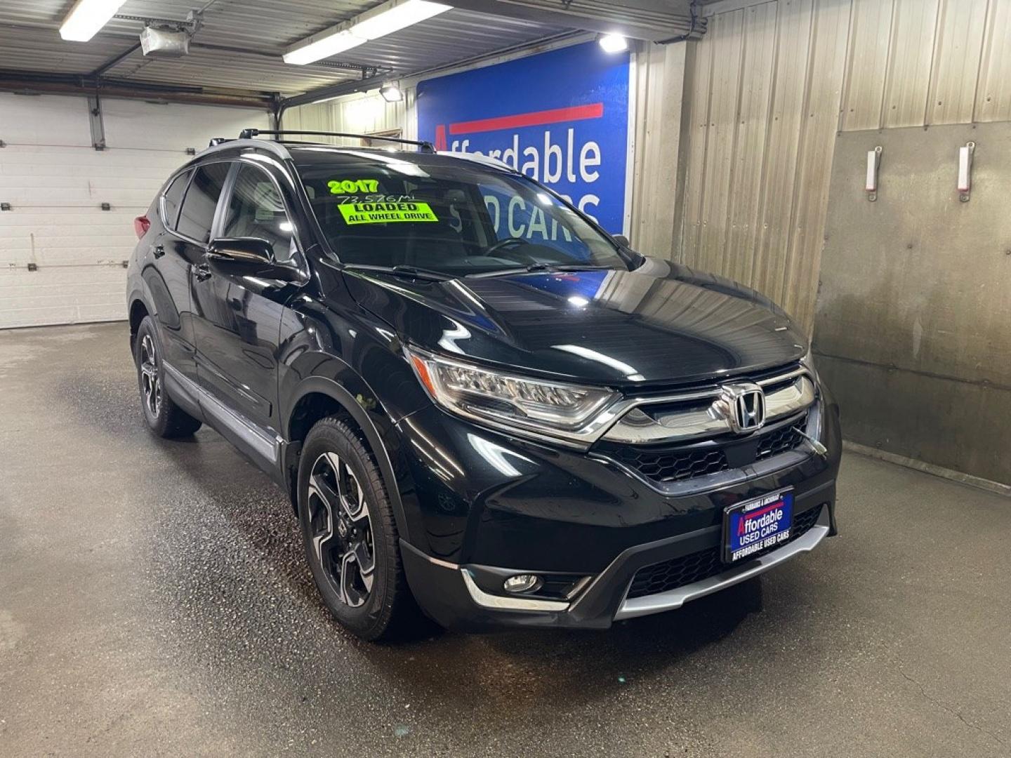 2017 BLACK HONDA CR-V TOURING (2HKRW2H94HH) with an 1.5L engine, Continuously Variable transmission, located at 2525 S. Cushman, Fairbanks, AK, 99701, (907) 452-5707, 64.824036, -147.712311- Photo#0