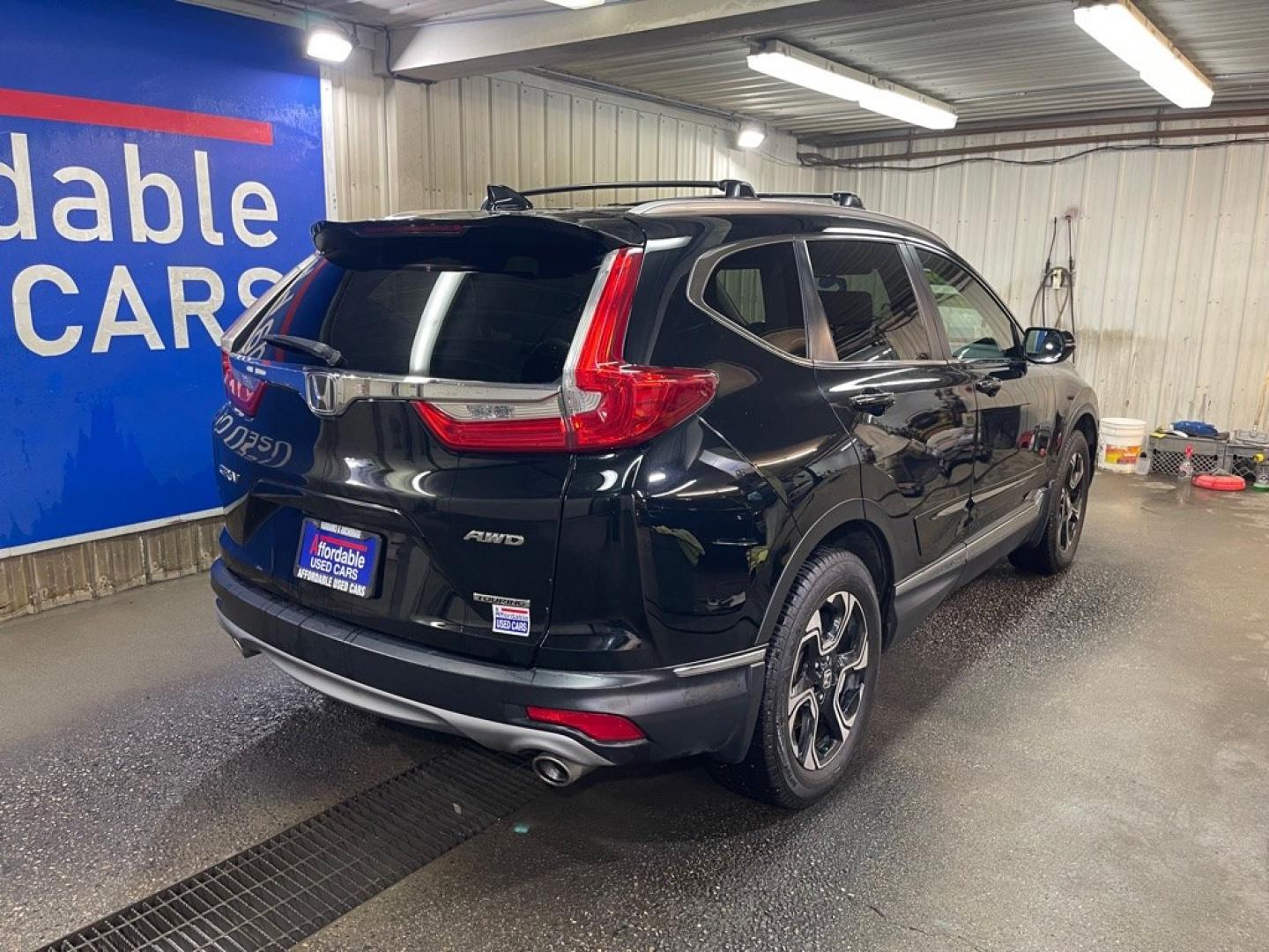 2017 BLACK HONDA CR-V TOURING (2HKRW2H94HH) with an 1.5L engine, Continuously Variable transmission, located at 2525 S. Cushman, Fairbanks, AK, 99701, (907) 452-5707, 64.824036, -147.712311- Photo#2