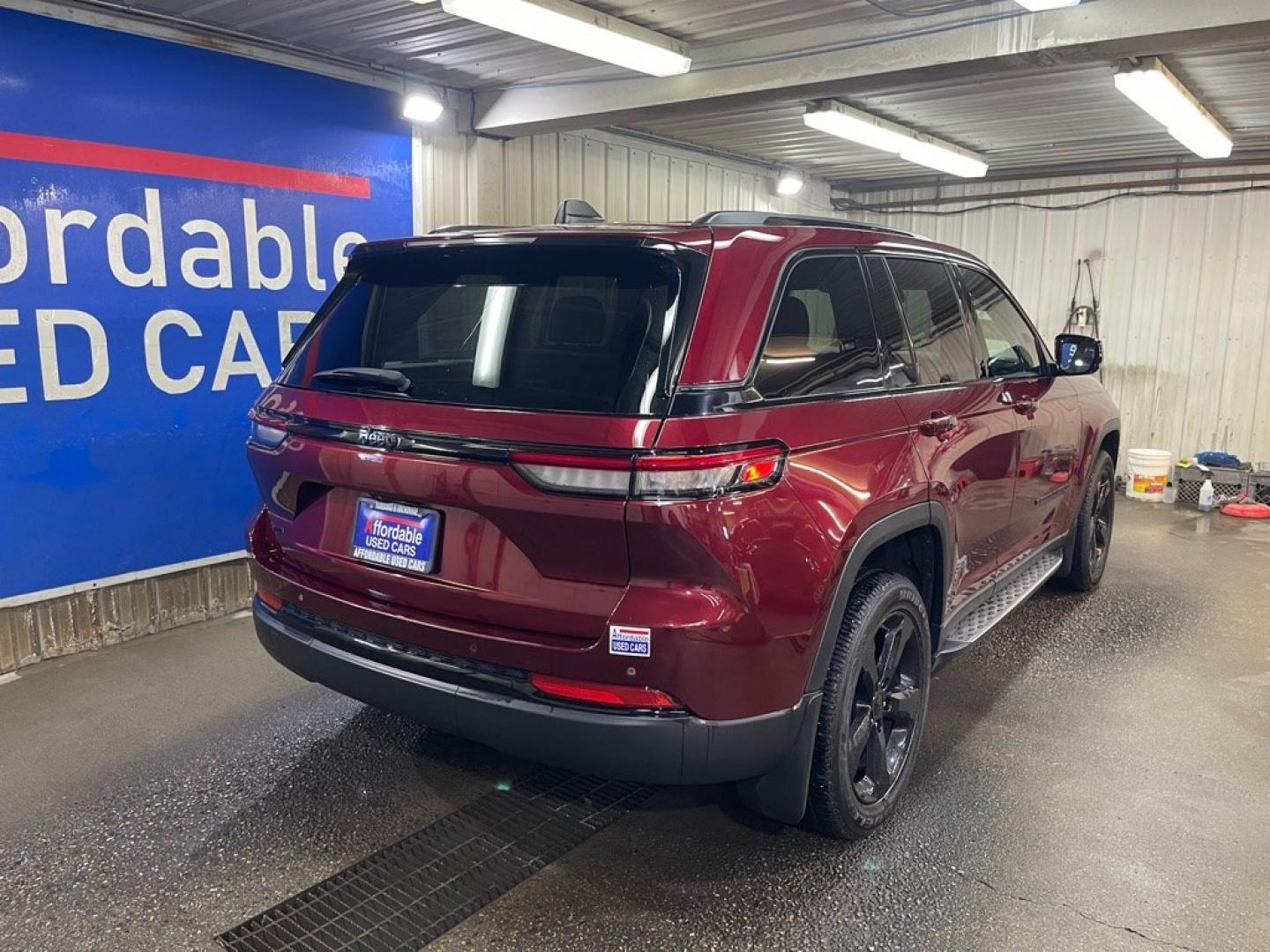 2023 MAROON JEEP GRAND CHEROKEE ALTITUDE (1C4RJHAG0PC) with an 3.6L engine, Automatic transmission, located at 2525 S. Cushman, Fairbanks, AK, 99701, (907) 452-5707, 64.824036, -147.712311- Photo#2