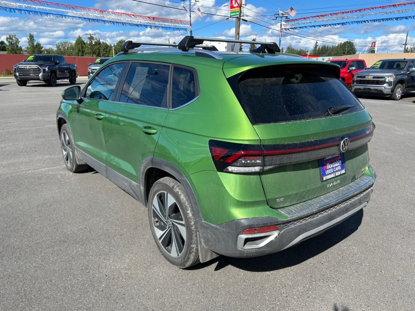 2025 GREEN VOLKSWAGEN TAOS SE (3VVVC7B26SM) with an 1.5L engine, Automatic transmission, located at 2525 S. Cushman, Fairbanks, AK, 99701, (907) 452-5707, 64.824036, -147.712311- Photo#3