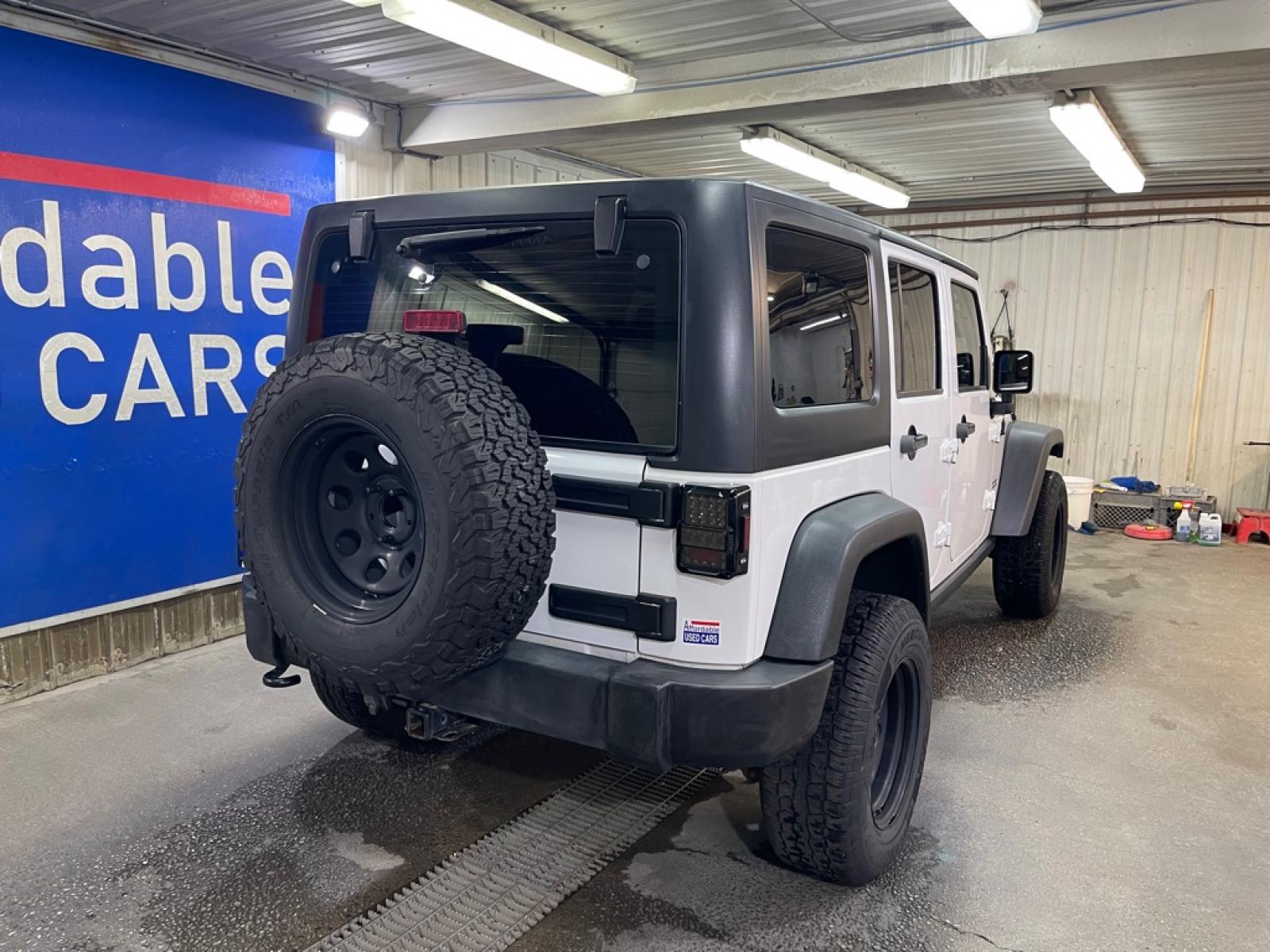 2017 WHITE JEEP WRANGLER UNLIMI SPORT (1C4BJWDG2HL) with an 3.6L engine, Automatic transmission, located at 2525 S. Cushman, Fairbanks, AK, 99701, (907) 452-5707, 64.824036, -147.712311 - Photo#2