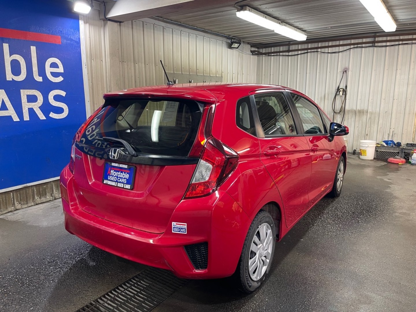 2016 RED HONDA FIT LX (JHMGK5H58GX) with an 1.5L engine, Continuously Variable transmission, located at 2525 S. Cushman, Fairbanks, AK, 99701, (907) 452-5707, 64.824036, -147.712311- Photo#2