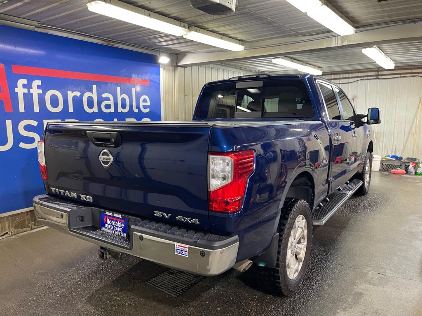 2016 BLUE NISSAN TITAN XD SL (1N6BA1F46GN) with an 5.0L engine, Automatic transmission, located at 2525 S. Cushman, Fairbanks, AK, 99701, (907) 452-5707, 64.824036, -147.712311- Photo#2