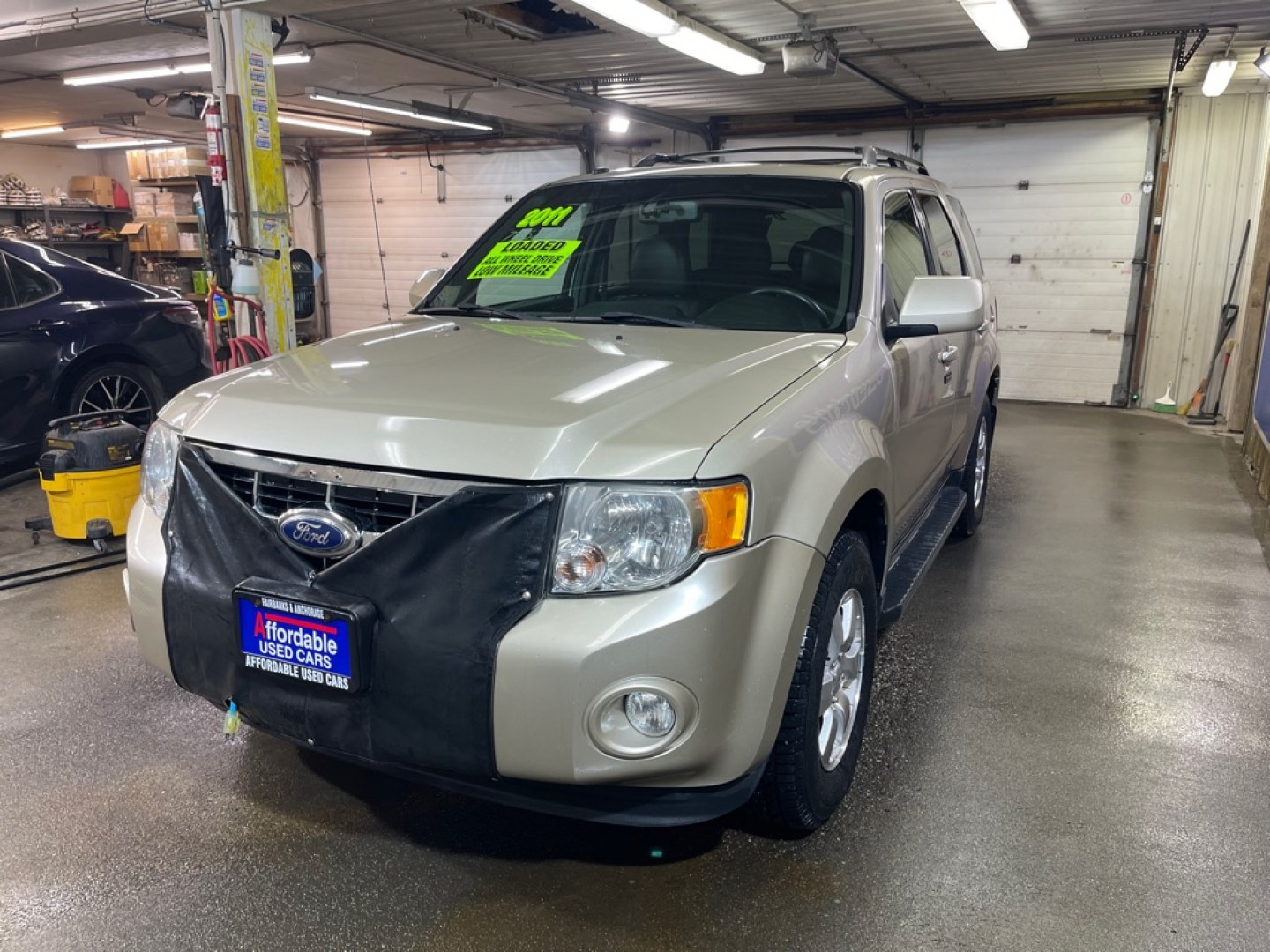 2011 TAN FORD ESCAPE LIMITED (1FMCU9EG3BK) with an 3.0L engine, Automatic transmission, located at 2525 S. Cushman, Fairbanks, AK, 99701, (907) 452-5707, 64.824036, -147.712311- Photo#1