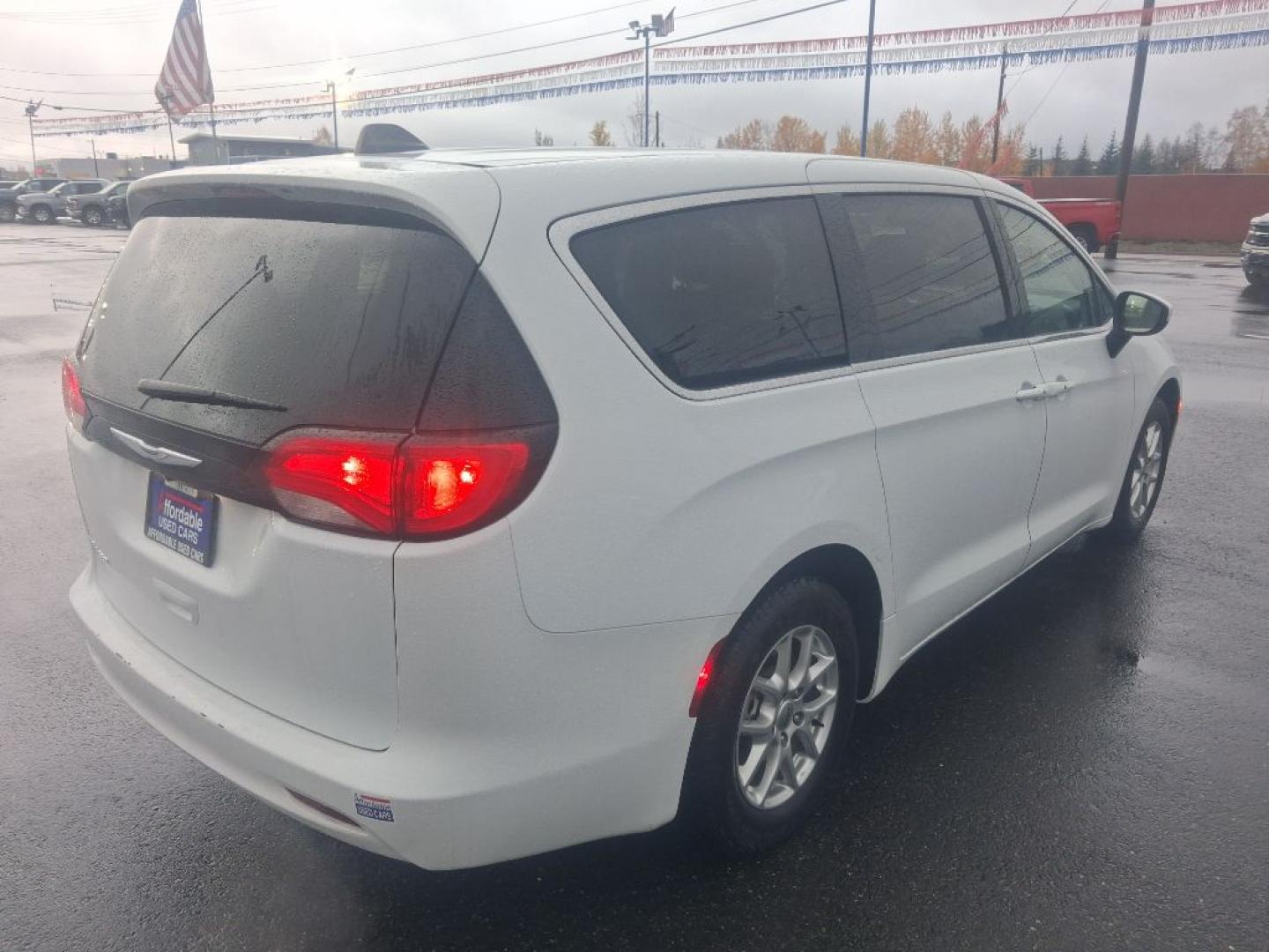 2023 WHITE CHRYSLER VOYAGER LX (2C4RC1CG3PR) with an 3.6L engine, Automatic transmission, located at 2525 S. Cushman, Fairbanks, AK, 99701, (907) 452-5707, 64.824036, -147.712311- Photo#2