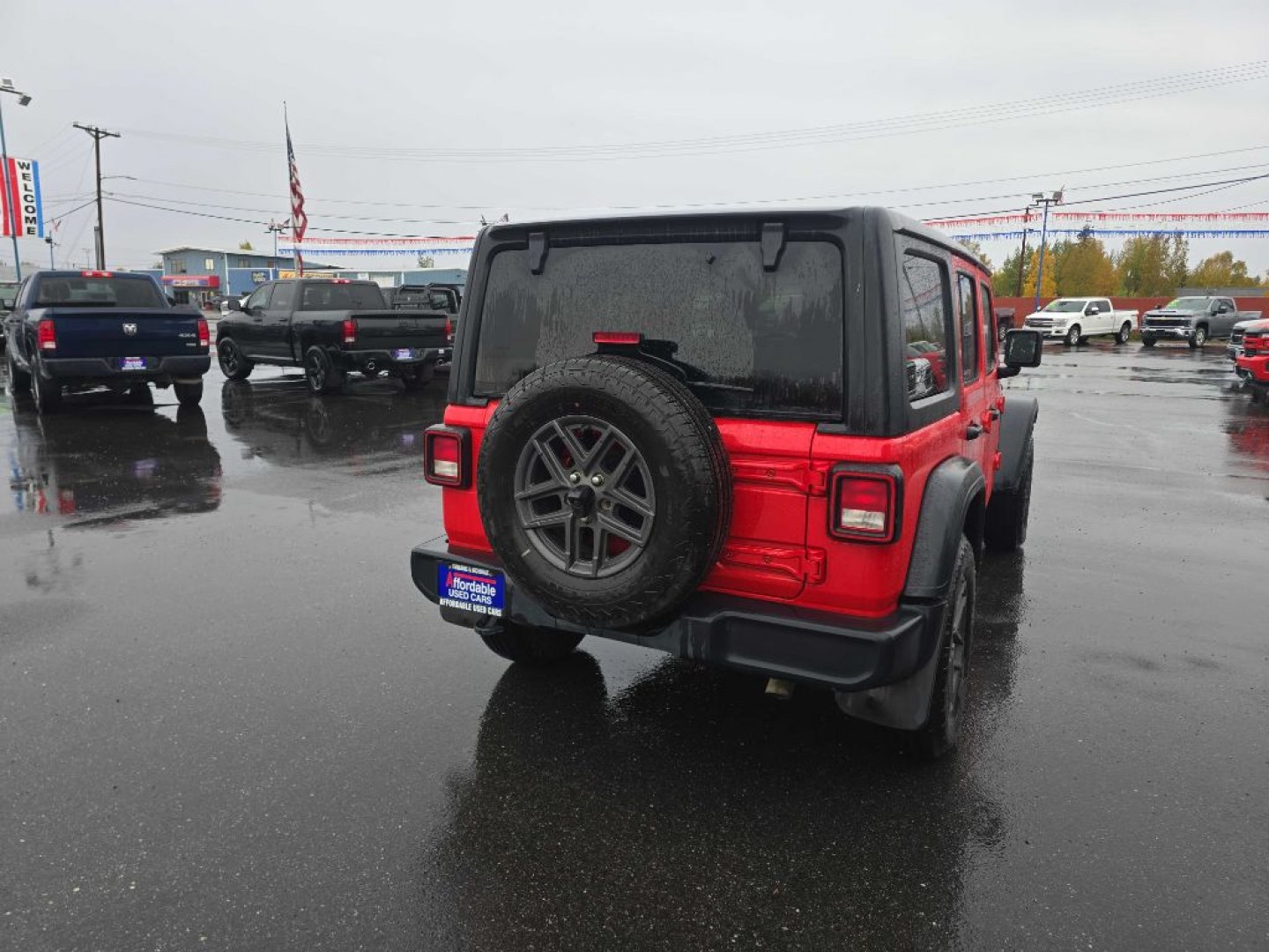 2024 RED JEEP WRANGLER SPORT SPORT (1C4PJXDG8RW) with an 3.6L engine, Automatic transmission, located at 2525 S. Cushman, Fairbanks, AK, 99701, (907) 452-5707, 64.824036, -147.712311- Photo#1