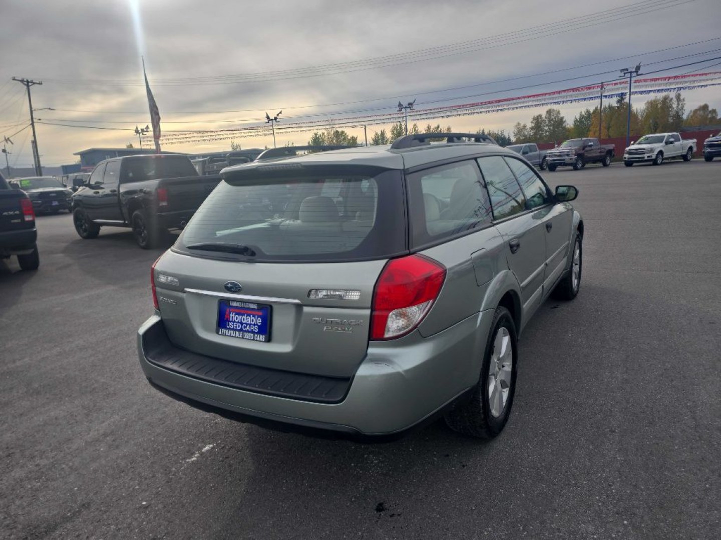 2009 GREEN SUBARU OUTBACK (4S4BP60C897) with an 2.5L engine, Automatic transmission, located at 2525 S. Cushman, Fairbanks, AK, 99701, (907) 452-5707, 64.824036, -147.712311- Photo#1
