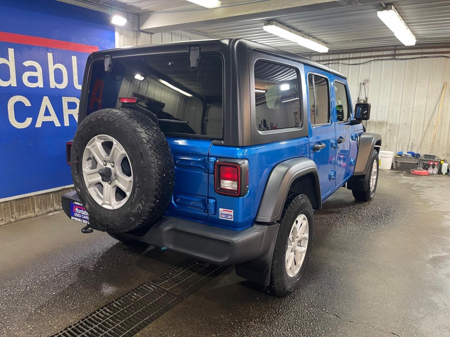 2023 BLUE JEEP WRANGLER SPORT (1C4HJXDN8PW) with an 2.0L engine, Automatic transmission, located at 2525 S. Cushman, Fairbanks, AK, 99701, (907) 452-5707, 64.824036, -147.712311- Photo#2