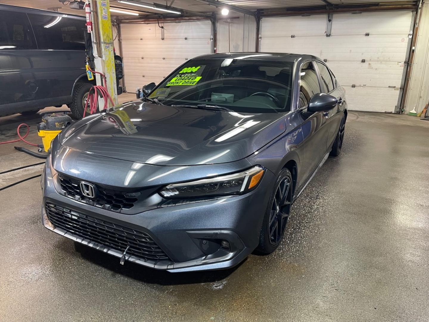 2024 GRAY HONDA CIVIC SPORT SPORT TOURING (19XFL1H81RE) with an 1.5L engine, Continuously Variable transmission, located at 2525 S. Cushman, Fairbanks, AK, 99701, (907) 452-5707, 64.824036, -147.712311- Photo#1