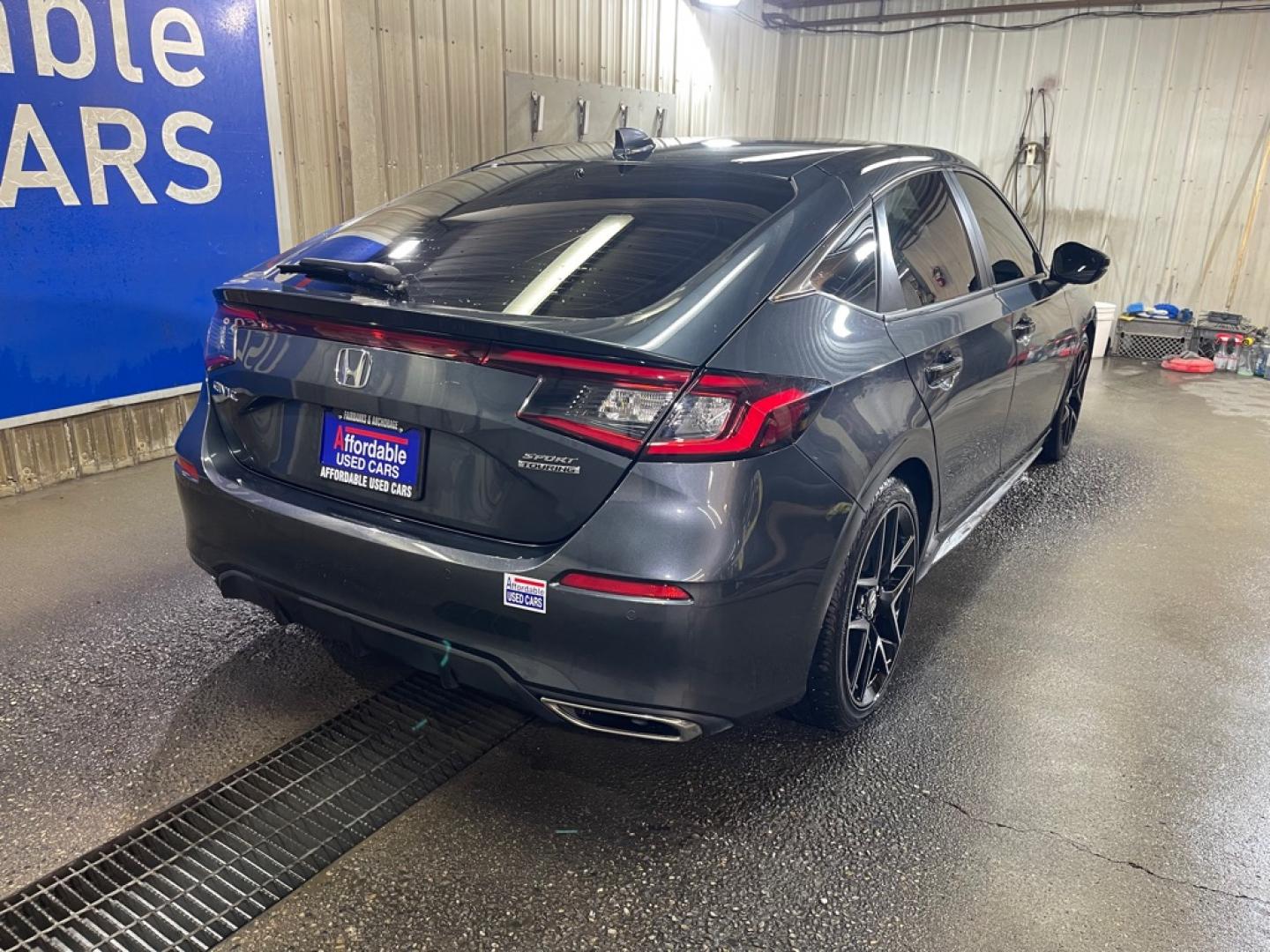2024 GRAY HONDA CIVIC SPORT SPORT TOURING (19XFL1H81RE) with an 1.5L engine, Continuously Variable transmission, located at 2525 S. Cushman, Fairbanks, AK, 99701, (907) 452-5707, 64.824036, -147.712311- Photo#2