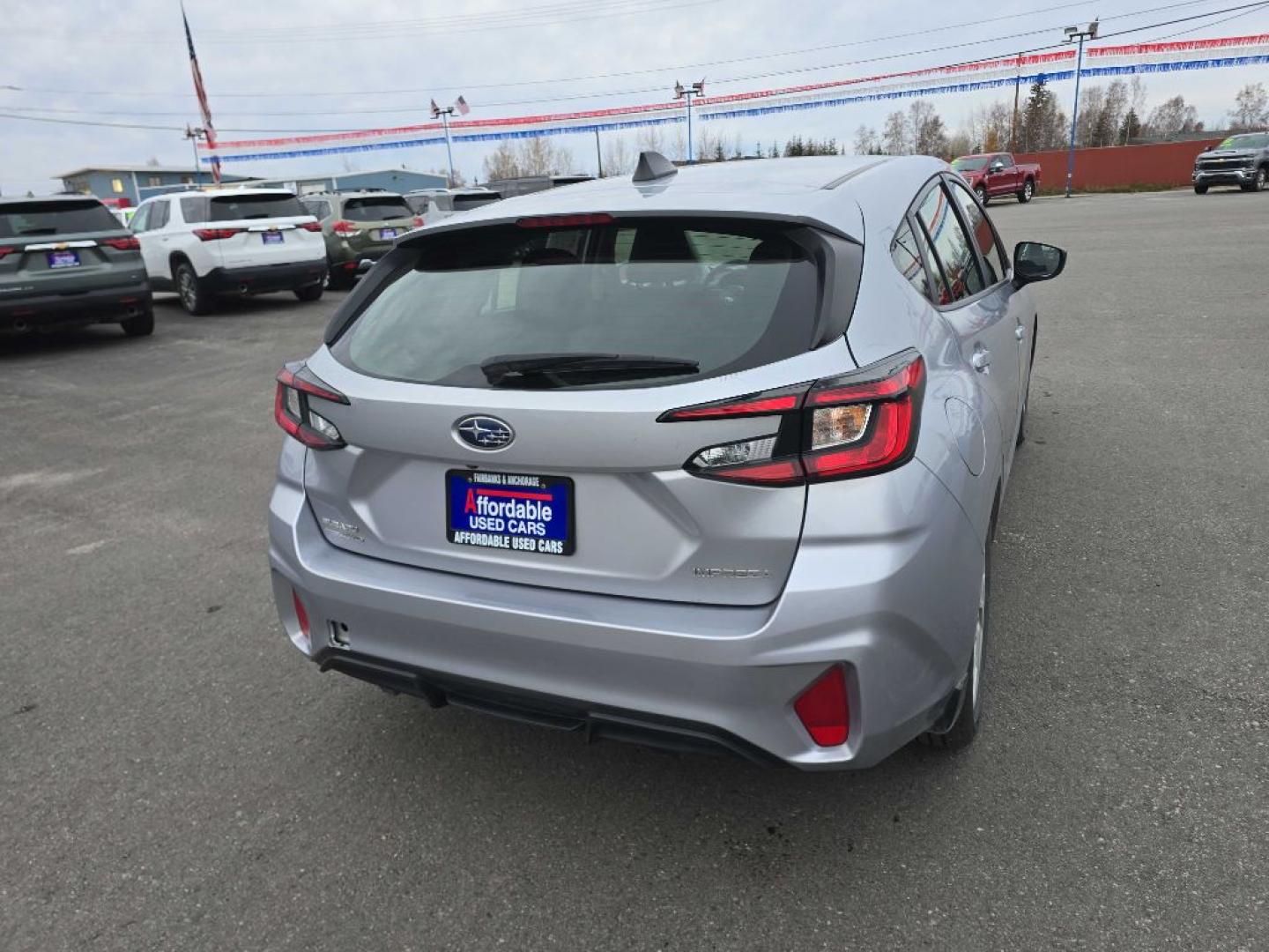 2024 SILVER SUBARU IMPREZA Hatchback (JF1GUABC2R8) with an 2.0L engine, Continuously Variable transmission, located at 2525 S. Cushman, Fairbanks, AK, 99701, (907) 452-5707, 64.824036, -147.712311- Photo#2