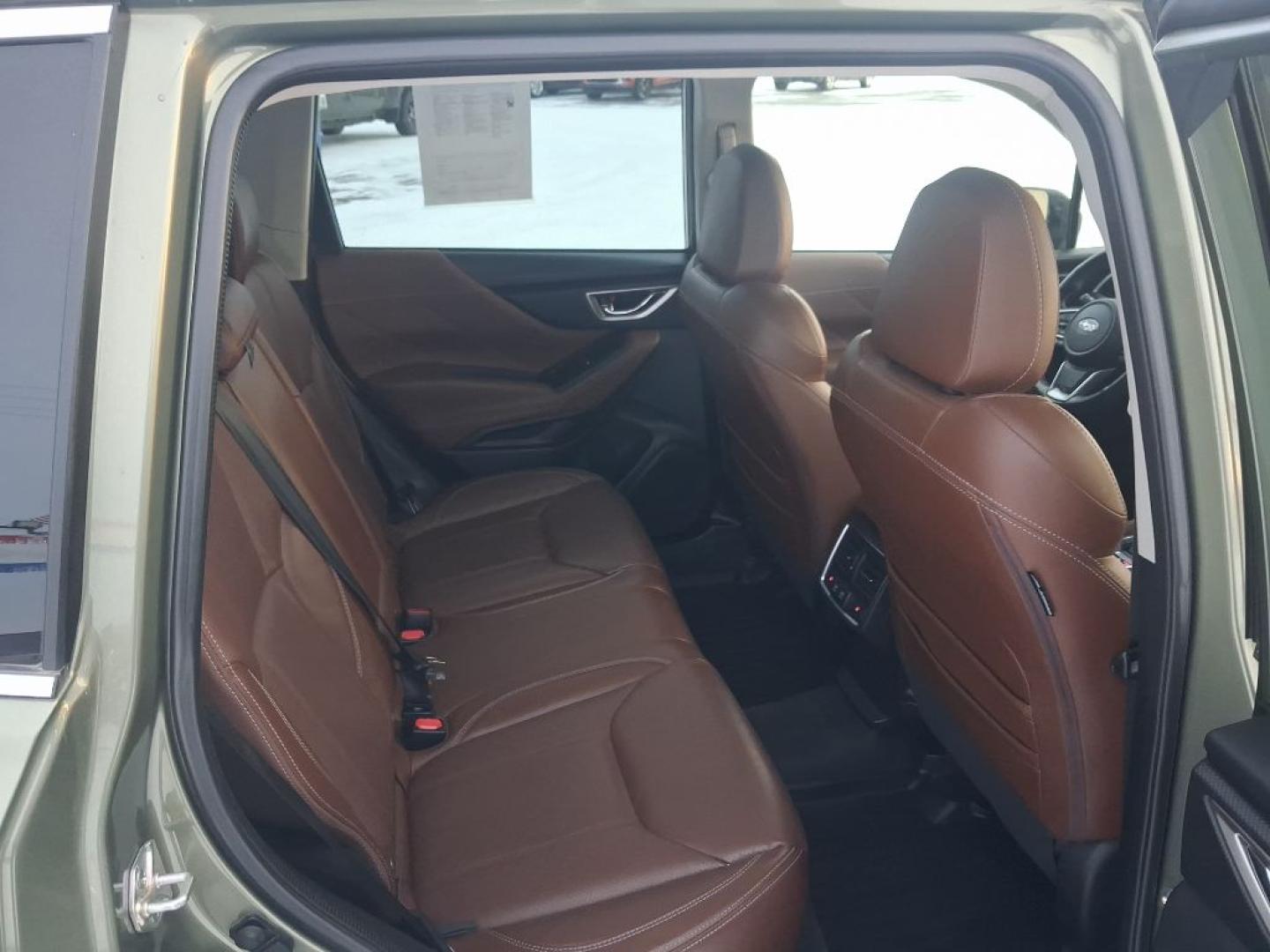 2021 GREEN SUBARU FORESTER TOURING (JF2SKAXC5MH) with an 2.5L engine, Automatic transmission, located at 2525 S. Cushman, Fairbanks, AK, 99701, (907) 452-5707, 64.824036, -147.712311- Photo#4