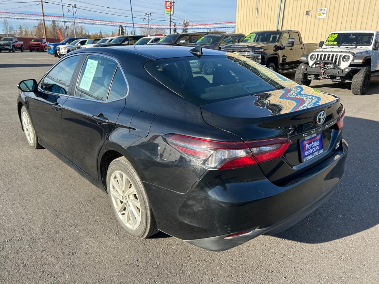 2024 BLACK TOYOTA CAMRY AWD LE (4T1R11BK9RU) with an 2.5L engine, Automatic transmission, located at 2525 S. Cushman, Fairbanks, AK, 99701, (907) 452-5707, 64.824036, -147.712311- Photo#3