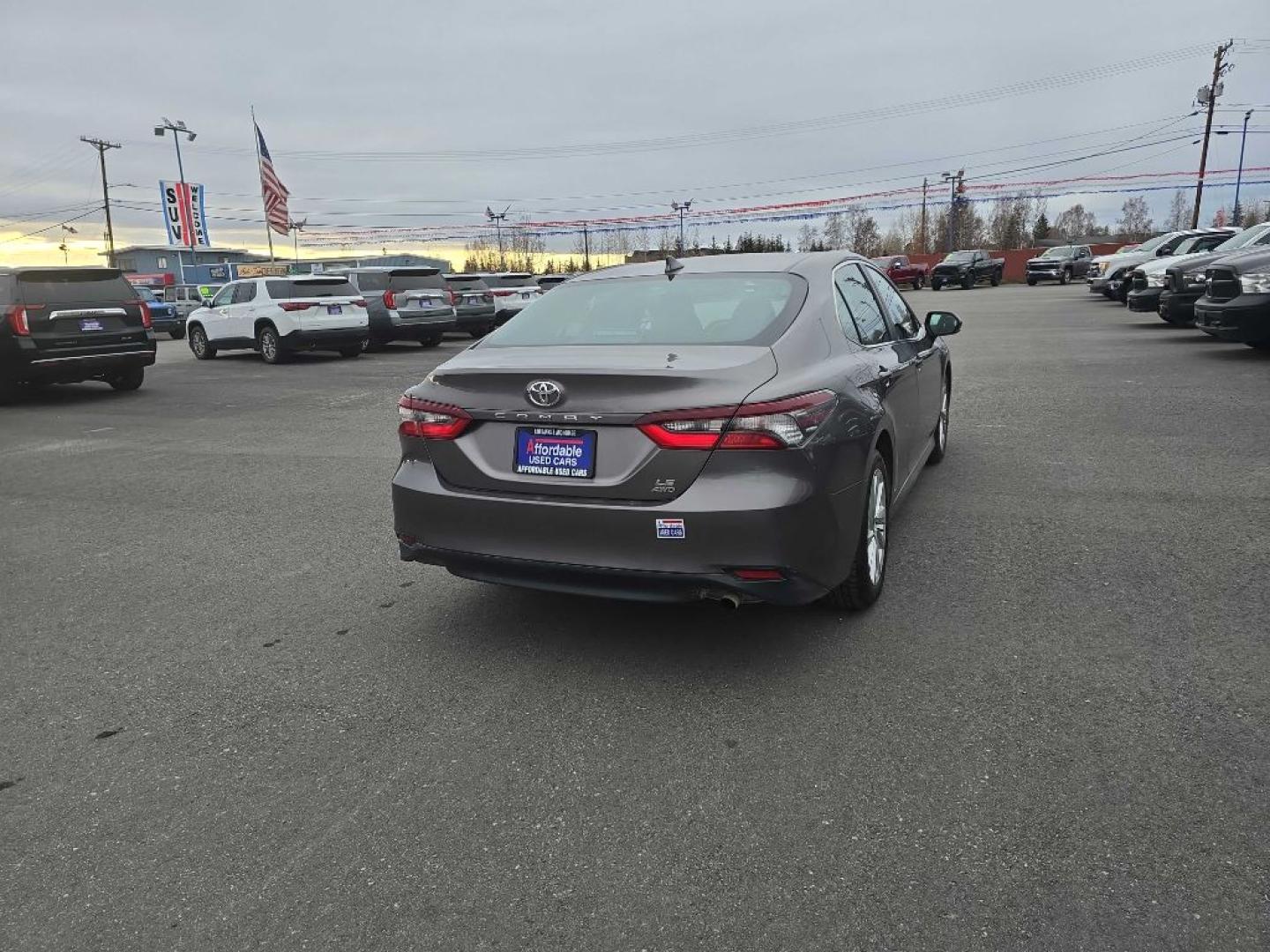 2024 BLACK TOYOTA CAMRY AWD LE (4T1R11BK7RU) with an 2.5L engine, Automatic transmission, located at 2525 S. Cushman, Fairbanks, AK, 99701, (907) 452-5707, 64.824036, -147.712311- Photo#3