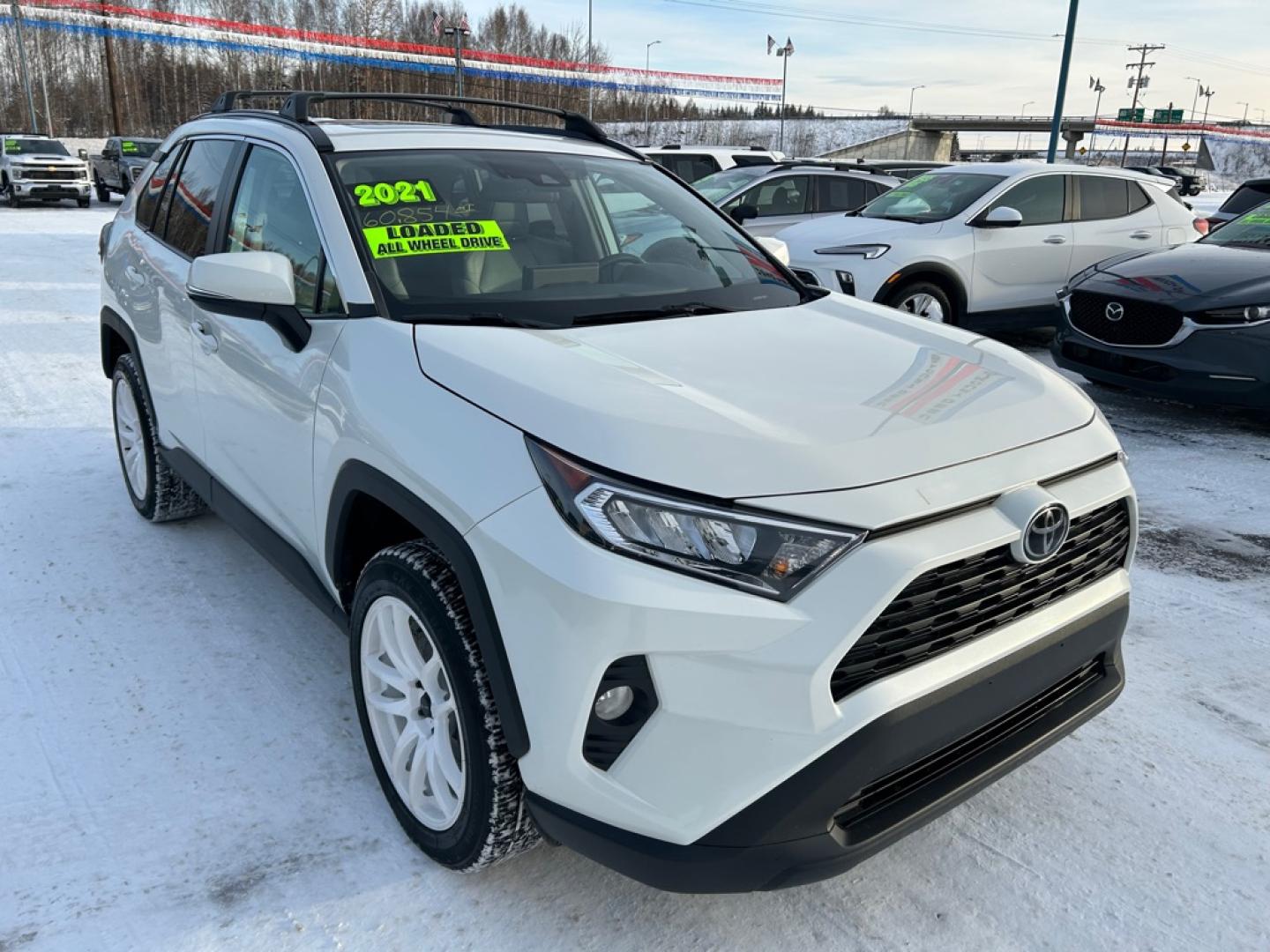 2021 WHITE TOYOTA RAV4 XLE PREMIUM (2T3A1RFV8MW) with an 2.5L engine, Automatic transmission, located at 2525 S. Cushman, Fairbanks, AK, 99701, (907) 452-5707, 64.824036, -147.712311- Photo#1