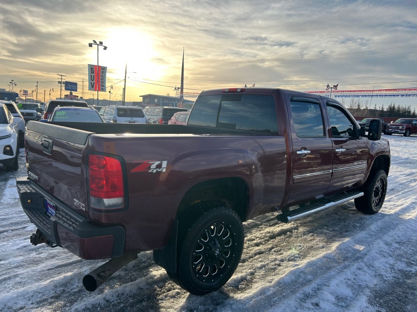 2013 MAROON GMC SIERRA 2500 DENALI (1GT125E80DF) with an 6.6L engine, Automatic transmission, located at 2525 S. Cushman, Fairbanks, AK, 99701, (907) 452-5707, 64.824036, -147.712311- Photo#2